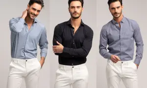 Uomo con camicie da uomo particolari: azzurra microfantasia, nera tinta unita e blu con fantasia geometrica, abbinate a pantaloni bianchi.
