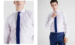 Uomo con camicia per cravatta rosa pallido e cravatta blu a maglia. Pantaloni blu eleganti.