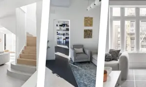 Interni moderni con scale in legno, divani grigi e tappeti che creano un'atmosfera accogliente. Ottimi colori da abbinare al grigio scuro abbigliamento.