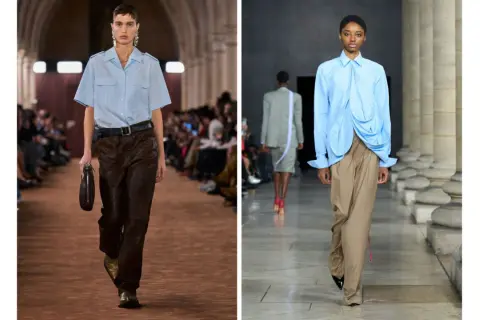 Modella con pantalone verde e camicia azzurra, un look audace e moderno.