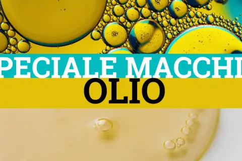 Bollicine d'olio su sfondo giallo e blu. Testo: "SPECIALE MACCHIE OLIO". Come rimuovere una macchia olio dai pantaloni.