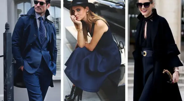 Uomo elegante in abito blu e trench, donna con abito blu e cappello, donna in nero con cappotto. L'abbinare blu e nero è un classico intramontabile.