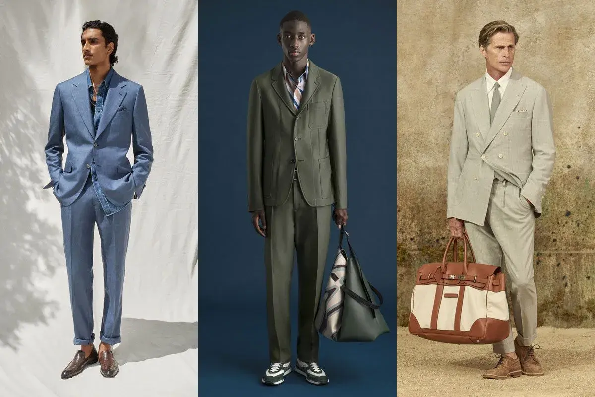 Tre uomini in abiti eleganti: blu, verde militare e grigio chiaro. Un esempio di abbinamento colori vestiti per un look sofisticato.