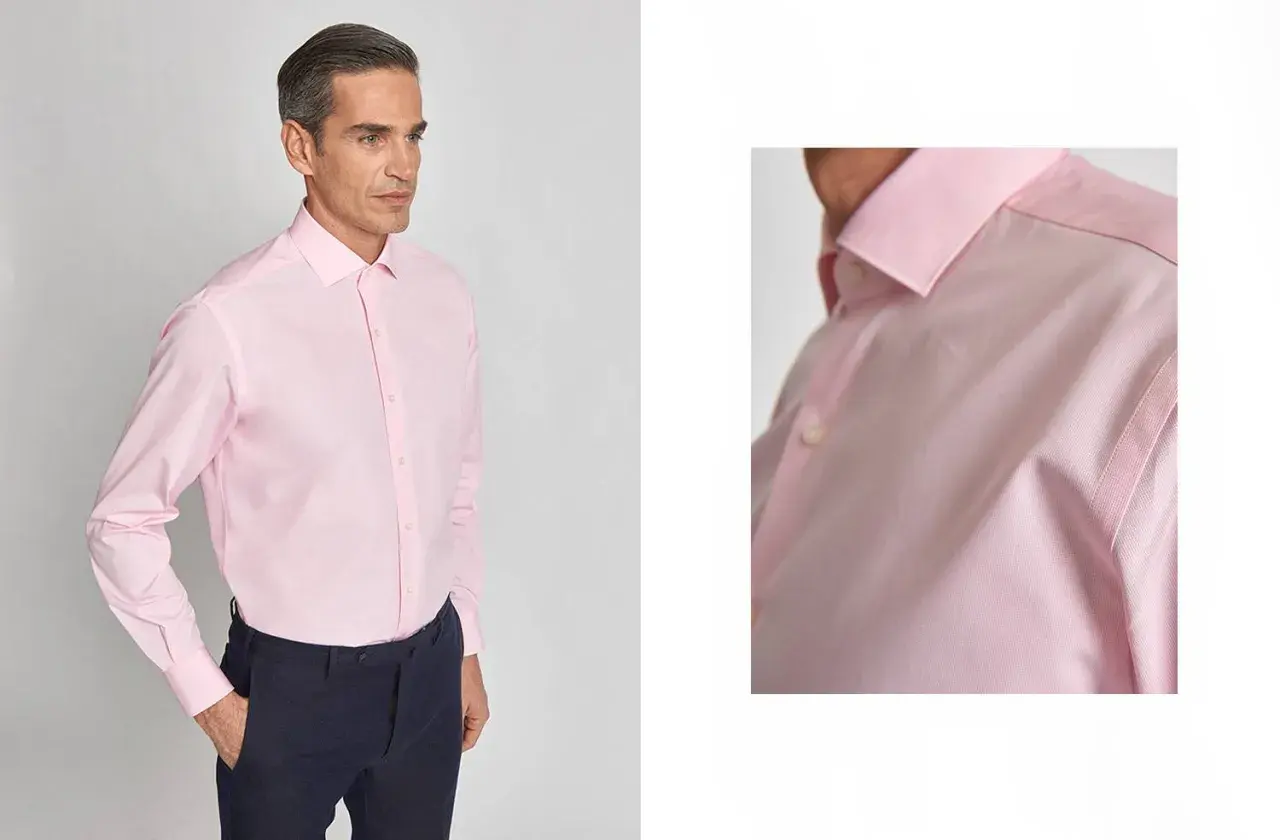 Uomo con camicia rosa e cravatta abbinata, un look elegante e raffinato.