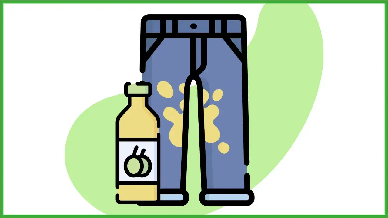Una bottiglia di detersivo accanto a dei pantaloni con una macchia d'olio.