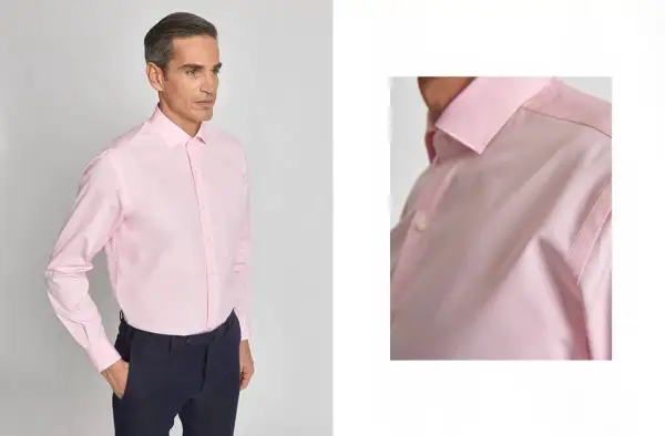 Uomo con camicia rosa e cravatta abbinata, un look elegante e raffinato.